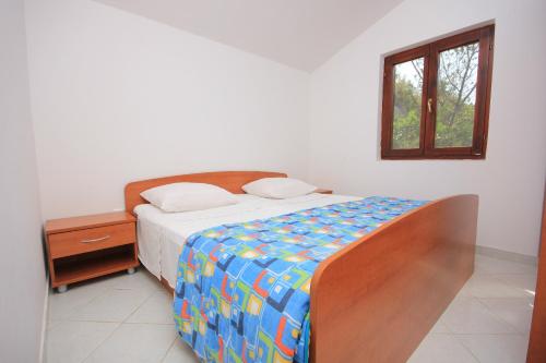 Posteľ alebo postele v izbe v ubytovaní Seaside secluded apartments Cove Dumboka bay - Dumboka (Dugi otok) - 489