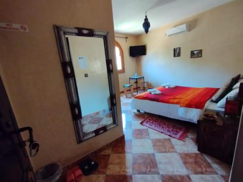 Una cama o camas en una habitación de Maison d´hôtes Amazir