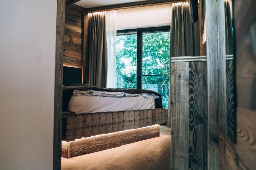 a bedroom with a bunk bed and a window at Landhaus Beckmann in Kalkar