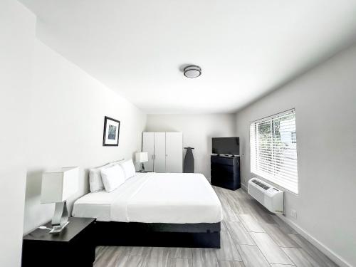 Cama o camas de una habitación en Beach Gardens