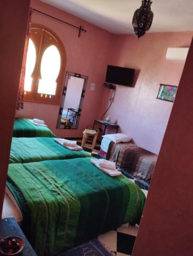Una cama o camas en una habitación de Maison d´hôtes Amazir