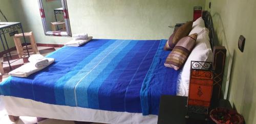 Una cama o camas en una habitación de Maison d´hôtes Amazir
