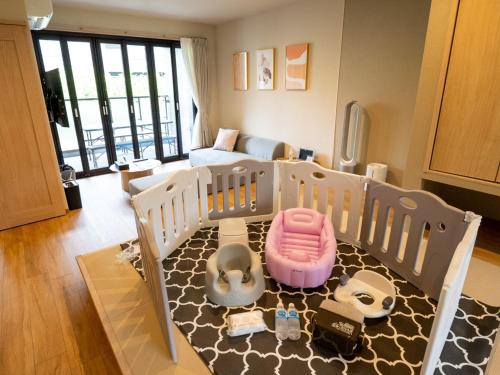 a childs bedroom with a bed and a living room at Rakuten STAY Nikko Hoden No pets allowed Capacity of 6 persons in Nikko