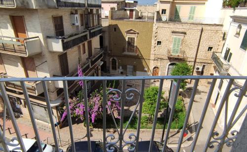 an apartment balcony with a view of a city at Appartamenti Boho Chic in Sannicandro di Bari