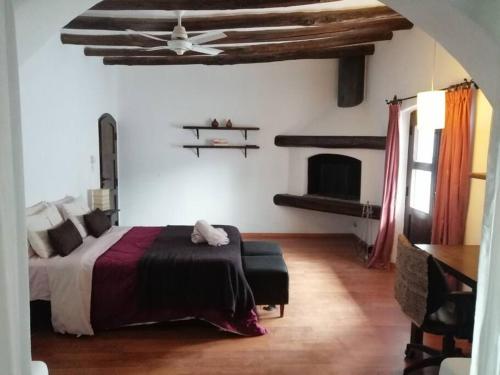 Postel nebo postele na pokoji v ubytování Casona La Oculta Mendoza