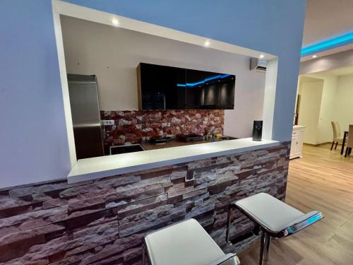 Μια τηλεόραση ή/και κέντρο ψυχαγωγίας στο Hugo Bianca LUX