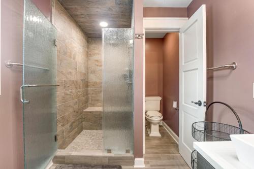 a bathroom with a glass shower with a toilet at Town of Ocean View --- 30680 Cedar Neck Rd in Ocean View