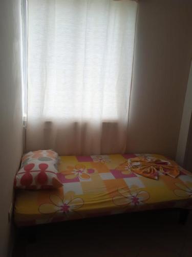 Cama o camas de una habitación en VACACIONES ARCO IRIS A−904