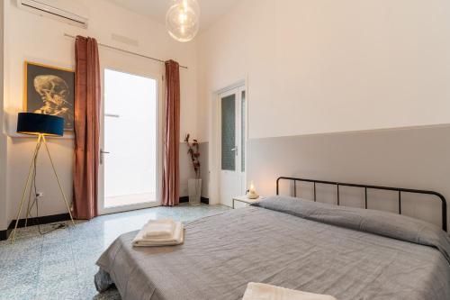 Katil atau katil-katil dalam bilik di LE CASE camera doppia con bagno privato e terrazza