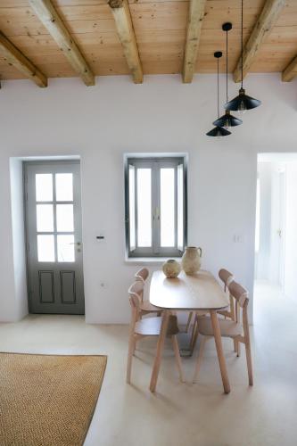 a table with a teddy bear on it in a room at Agapi Home in Agápi