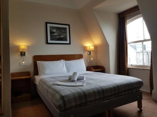 Postel nebo postele na pokoji v ubytování Aberdeen House