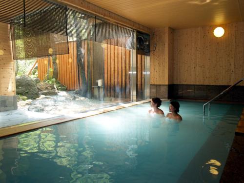 สระว่ายน้ำที่อยู่ใกล้ ๆ หรือใน Choyo Resort Hotel