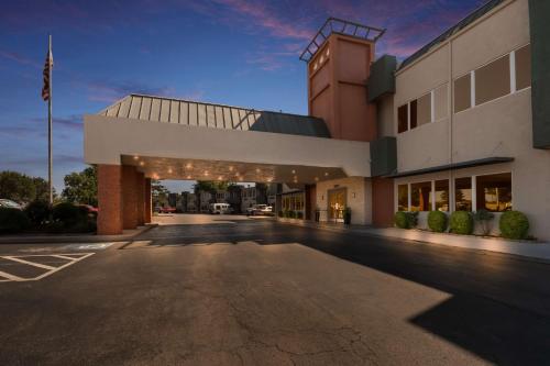 an empty parking lot in front of a building at Comancheria Hotel & Convention Center in Lawton