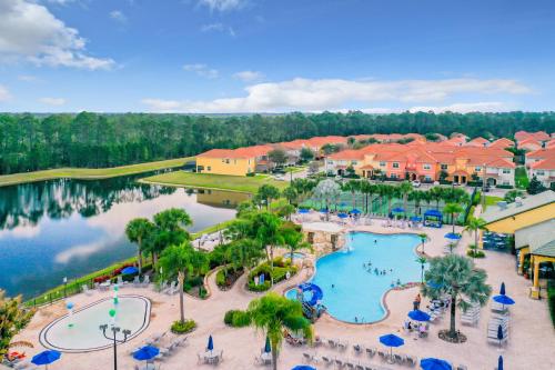 an aerial view of a resort with a swimming pool at Marvelous Magical House: Amazing Themes and Pool, 5mi Disney in Kissimmee