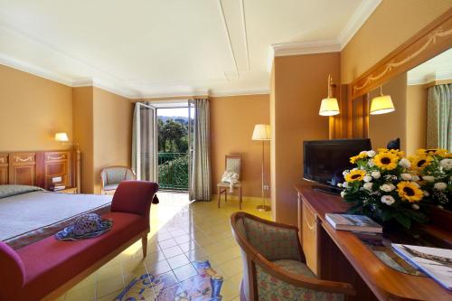 Postel nebo postele na pokoji v ubytování Grand Hotel La Pace - All Inclusive