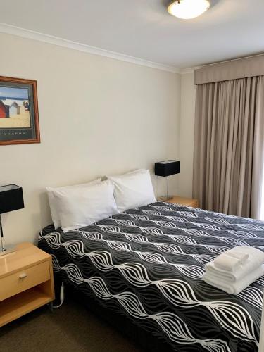 Postel nebo postele na pokoji v ubytování Seahorse Motel Cowes