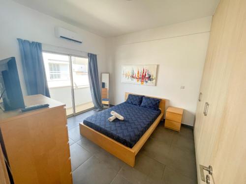 Postel nebo postele na pokoji v ubytování High Speed Holiday Apartment