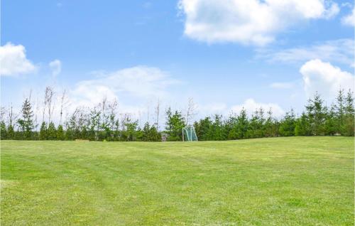 a field with a soccer goal in a field at 2 Bedroom Awesome Home In Jaroslawiec in Jarosławiec