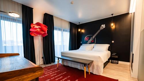 Katil atau katil-katil dalam bilik di Hills Hotel Lisboa
