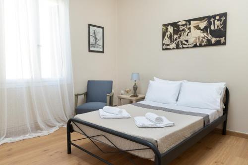 Posteľ alebo postele v izbe v ubytovaní Πλήρως ανακαινισμένη μονοκατοικία.