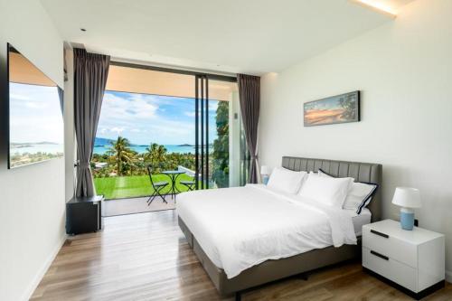 Postel nebo postele na pokoji v ubytování Villa Massimiliano Koh Samui