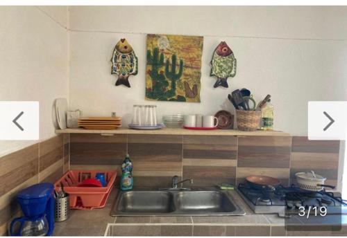 Kjøkken eller kjøkkenkrok på Departamento Rustico 2 recamas con garage