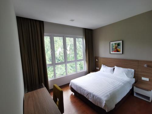 Katil atau katil-katil dalam bilik di Ipoh Heaven Central Lakeview Suite 3rooms 3-8pax