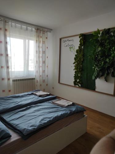 Posteľ alebo postele v izbe v ubytovaní Apartamenty centrum