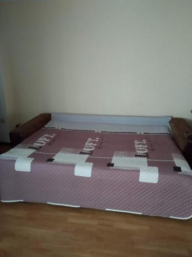 Llit o llits en una habitació de квартира в районі автовокзалу