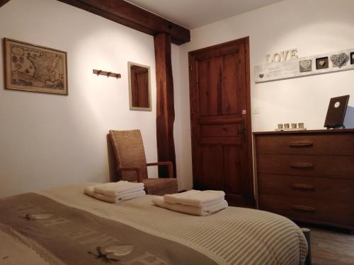 Postel nebo postele na pokoji v ubytování Domaine du Mas Naut