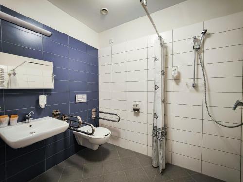 Koupelna v ubytování Antonińska Hotel & Apartamenty