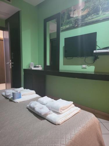 TV a/nebo společenská místnost v ubytování Sorrento Relais