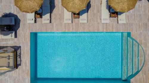 an overhead view of a swimming pool in a building at Akasha Villa, an Alluring Retreat,By ThinkVilla in Zakynthos