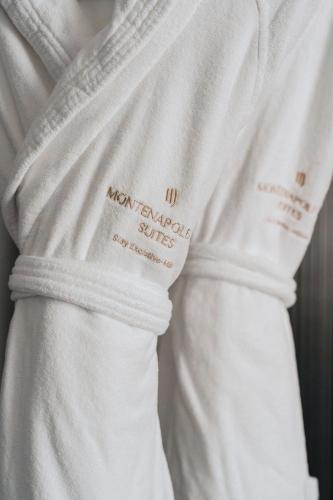 a close up of a white shirt with a label on it at Montenapoleone Suites in Milan