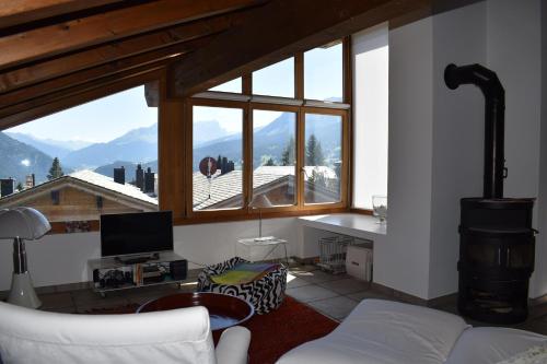 a living room with a view of a mountain at Beal Lia Haus C 474 Bh Whg 8 in Lenz