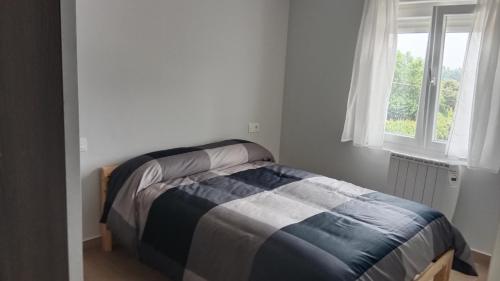 Posteľ alebo postele v izbe v ubytovaní Apartamento nuevo cerca de la costa y a 15 min de Bilbao!