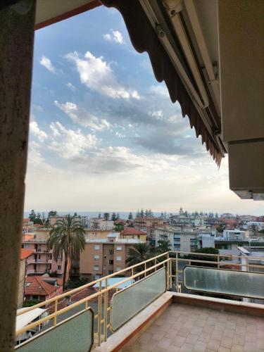 a view of a city from the balcony of a building at Attico con vista mozzafiato in Bordighera