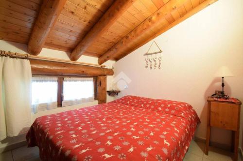 Ένα ή περισσότερα κρεβάτια σε δωμάτιο στο Appartamento incantevole con vista sulla vallata
