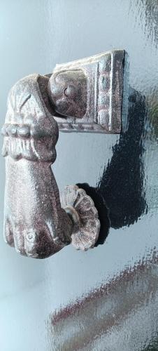 a close up of a car door handle with a car wheel at B&B Villa Deseada in Periana