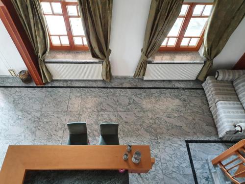 an overhead view of a room with a table and chairs at Ferienhaus Panorama in Rechnitz