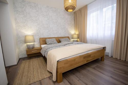 Postel nebo postele na pokoji v ubytování Apartmán LIPNO Z1 - Frymburk
