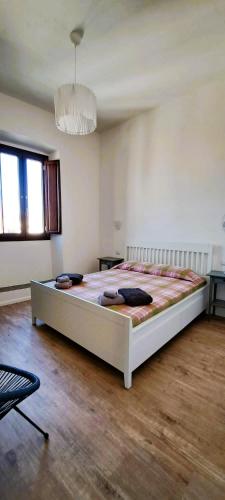 a bedroom with a large bed in a room at Civico Otto7 in Villasimius