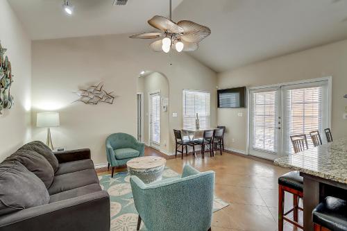 a living room with a couch and a table at Marquesas #310 in Padre Island