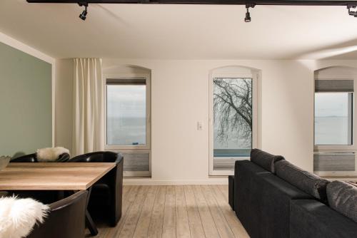 Ruang duduk di Strandappartements Steinberghaff "Ærö" mit Meerblick