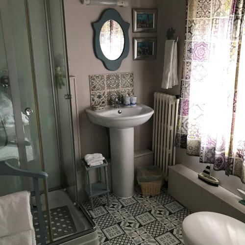 Ένα μπάνιο στο Chambres d'Hôtes Bienvenue