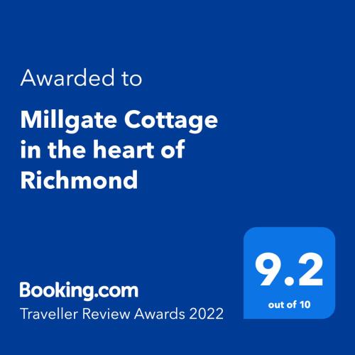 a screenshot of a cell phone with the text awarded to millennium cottage in the heart at Millgate Cottage in the heart of Richmond in Richmond