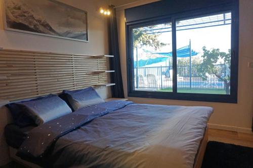 Postel nebo postele na pokoji v ubytování Ohn-Bar Guesthouse