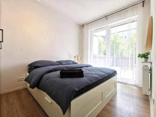 Posteľ alebo postele v izbe v ubytovaní Matejki Apartment ~ Self Check-In 24 ~ Parking