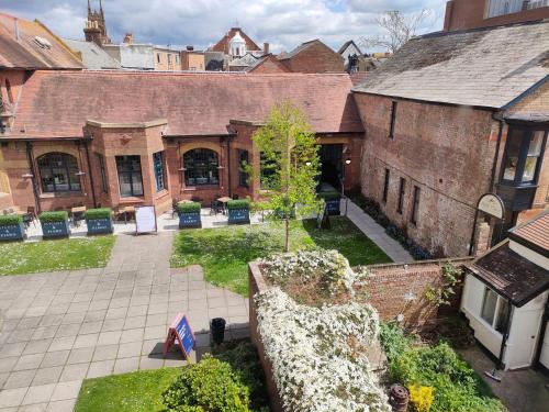 an aerial view of an old brick building at Stunning 2-bed Listed Apartment in Taunton's historic centre in Taunton