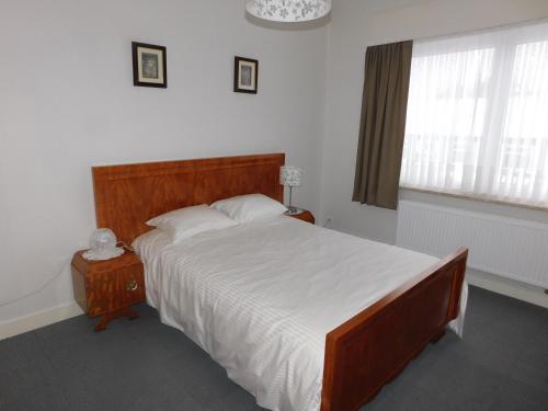 Postel nebo postele na pokoji v ubytování Vakantiewoning Louis